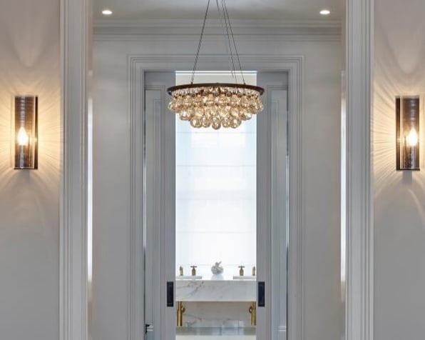 A powered pocket door designed to be used by people with disabilities, used as a bathroom door. 